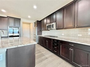 9187 Swan River St in Littleton, CO - Building Photo - Building Photo