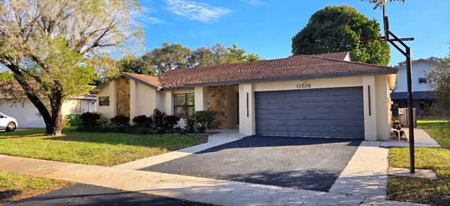 property at 11516 SW 54th St