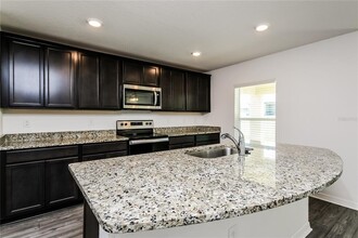 1375 Swan Lake Cir in Dundee, FL - Building Photo - Building Photo