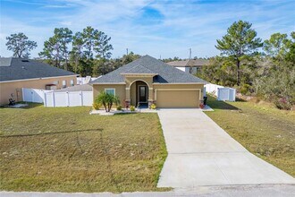 56 Orchid Ct in Poinciana, FL - Building Photo - Building Photo