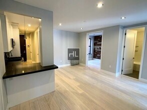 Stanton Street, Unit 6G in New York, NY - Building Photo - Building Photo