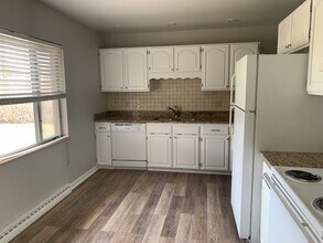 7991 E Hampden Cir in Denver, CO - Building Photo - Building Photo