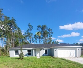 58 Reidsville Dr in Palm Coast, FL - Foto de edificio - Building Photo