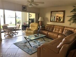 595 Beachwalk Cir-Unit -M-103 in Naples, FL - Building Photo - Building Photo