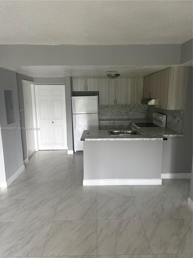 property at 3901 NW 9th Ave