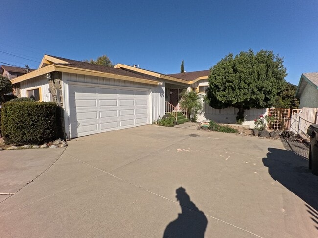 property at 1237 W 124th St