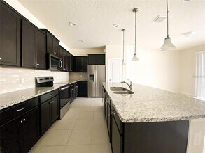 2406 Dubai St in Kissimmee, FL - Building Photo - Building Photo