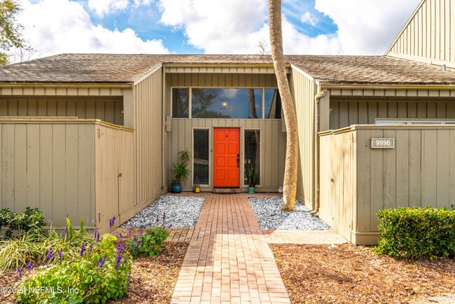property at 9996 Sawgrass Dr E