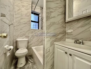 87 Post Ave in New York, NY - Building Photo - Building Photo