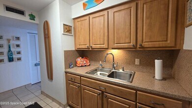 8401 N Atlantic Ave, Unit A-9 in Cape Canaveral, FL - Building Photo - Building Photo