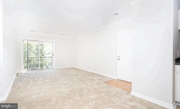 8205 Whispering Oaks Way, Unit 304 in Gaithersburg, MD - Building Photo - Building Photo