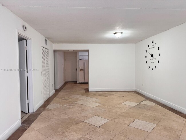 property at 6115 NW 186th St