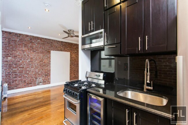 E 100TH ST. in New York, NY - Building Photo - Building Photo
