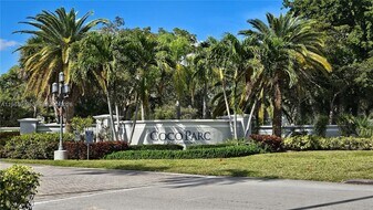 801 Lyons Rd in Coconut Creek, FL - Building Photo