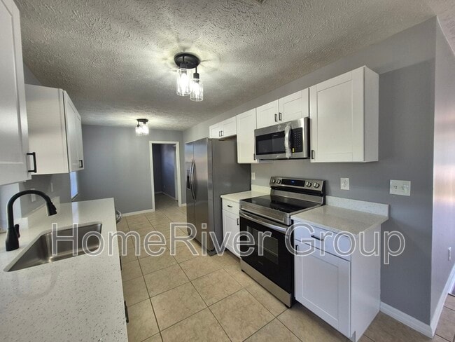 1449 SE Barker Ln in Port St. Lucie, FL - Building Photo - Building Photo