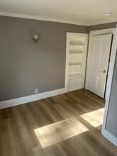 122 Sibben St, Unit Apartment A in Manistee, MI - Building Photo - Building Photo