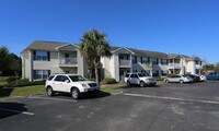 Primary Photo - The Palms Apartments in Gulfport, Mississippi