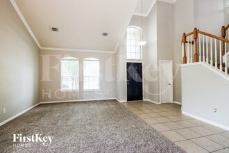 1002 Alp Springs Ln in Spring, TX - Foto de edificio - Building Photo