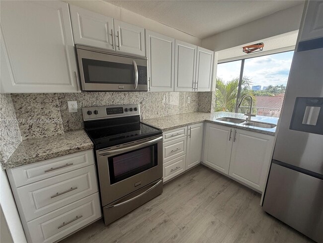 property at 9410 W Flagler St