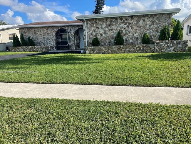property at 9590 NW 24th Pl