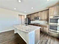 4825 S Versailles St in Aurora, CO - Building Photo - Building Photo