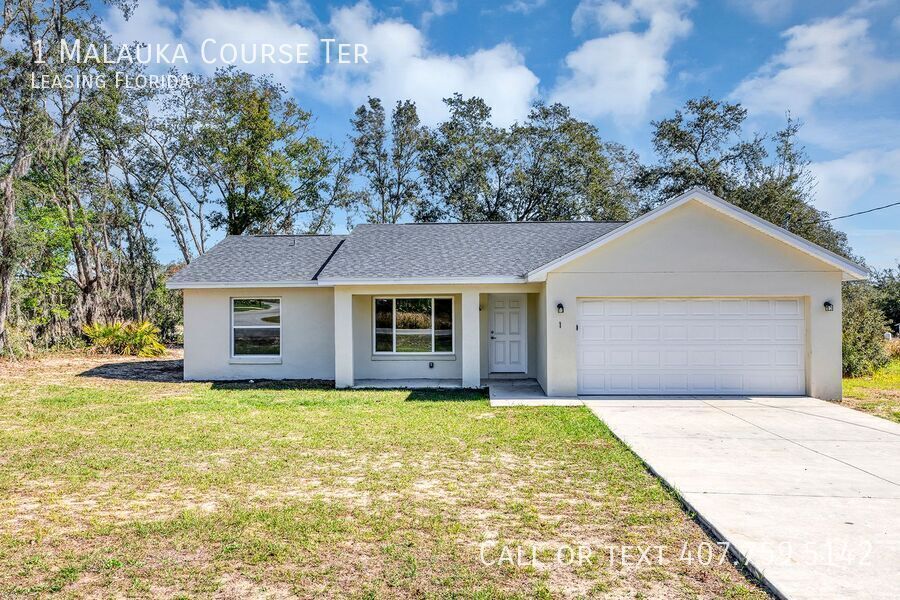 1 Malauka Course Terrace in Ocklawaha, FL - Building Photo