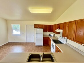 94-1727-1727 Kaulua St in Naalehu, HI - Building Photo - Building Photo