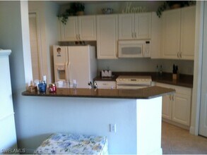 1370 Sweetwater Cove in Naples, FL - Building Photo - Building Photo