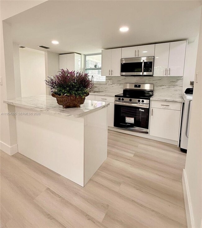 property at 4431 NW 13th St