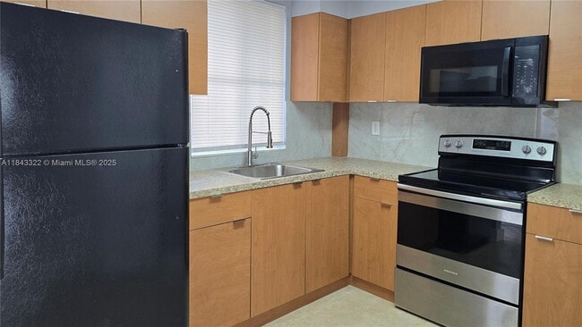 property at 6175 NW 186th St