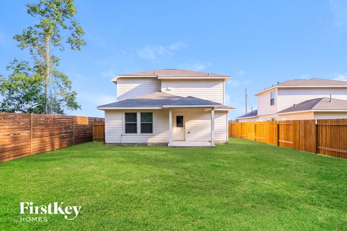 25621 Roy Rogers Rd in Patton Village, TX - Building Photo