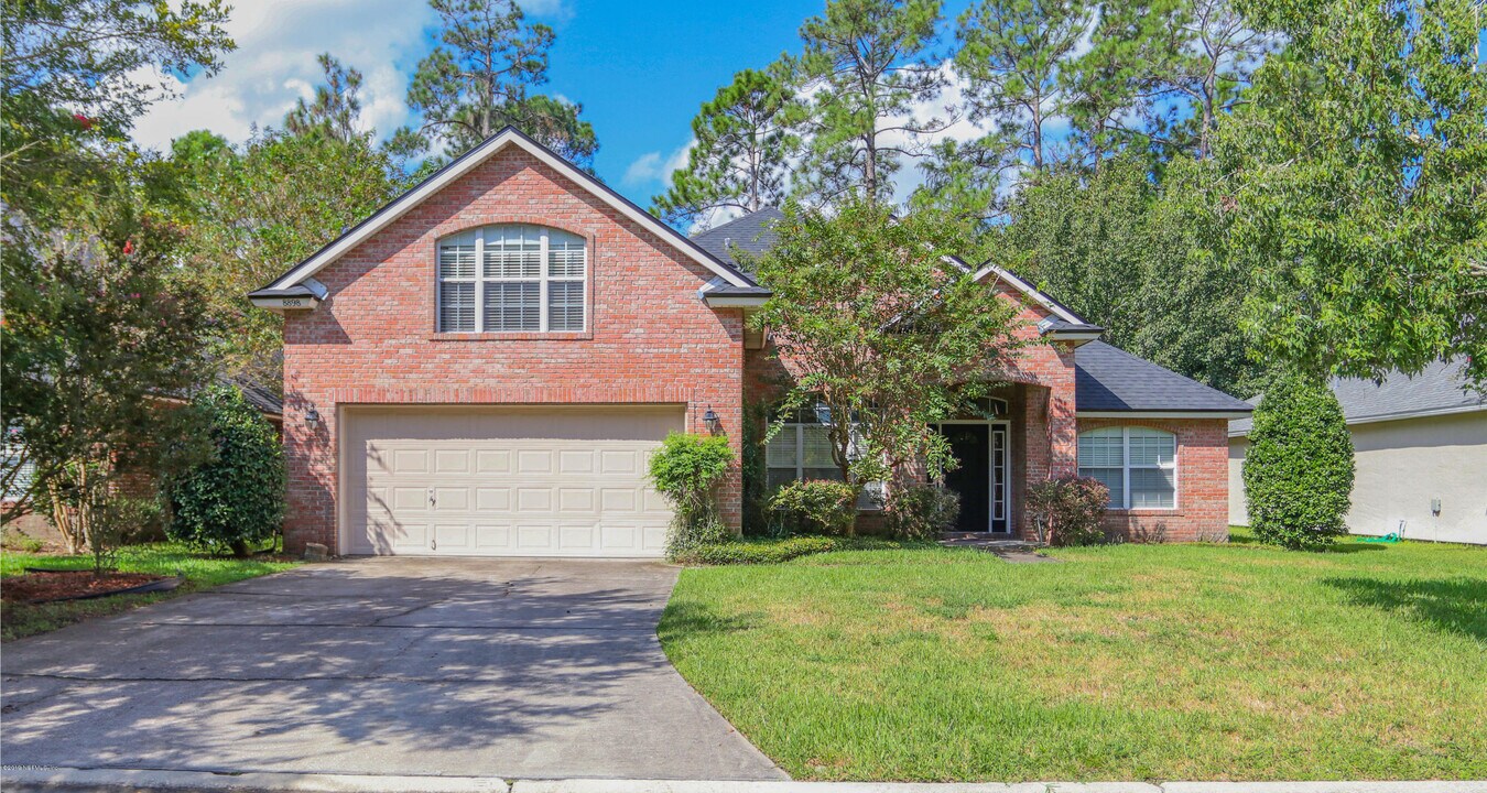 8898 Canopy Oaks Dr in Jacksonville, FL - Building Photo