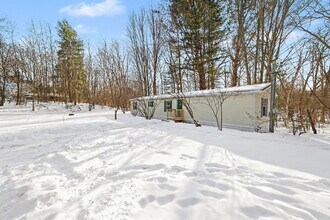 1413 W Sian Dr in Sanford, MI - Building Photo - Building Photo