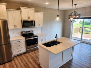 1603 Red Cedar Ln in Granger, IA - Building Photo - Building Photo