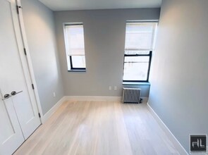 Stanton Street, Unit 6G in New York, NY - Building Photo - Building Photo
