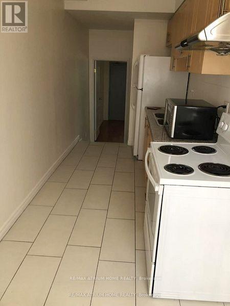 property at 413-413 Spadina Ave.