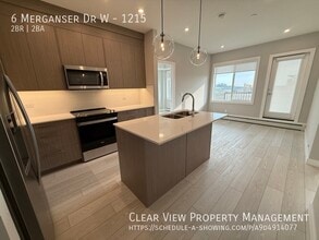 6 Merganser Dr W in Chestermere, AB - Building Photo - Building Photo
