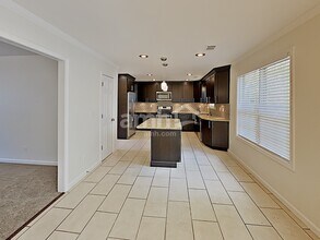 1067 Woodsong Pass Ct in Lawrenceville, GA - Foto de edificio - Building Photo