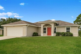 124 Gilbert Ave S in Lehigh Acres, FL - Building Photo - Building Photo