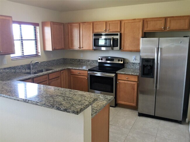 22301 SW 88th Pl in Cutler Bay, FL - Building Photo - Building Photo