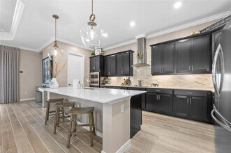 5994 Berwick Ln in Ave Maria, FL - Foto de edificio - Building Photo