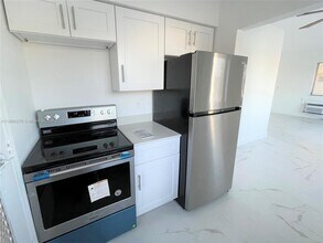 6895 Byron Ave in Miami, FL - Building Photo - Building Photo