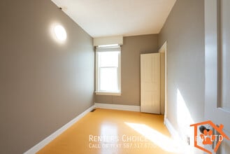 2 Bedroom Pet Friendly Main Floor, BONUS I in Lethbridge, AB - Building Photo - Building Photo
