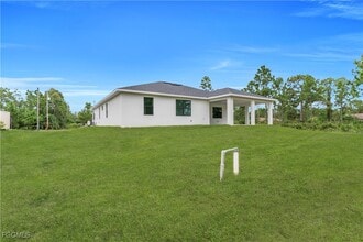 708 Poinsettia Ave in Lehigh Acres, FL - Building Photo - Building Photo