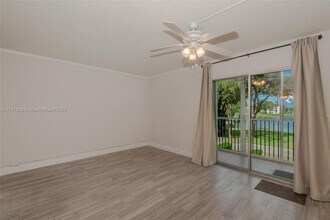 300 SW 134th Way, Unit 203 E in Pembroke Pines, FL - Building Photo - Building Photo