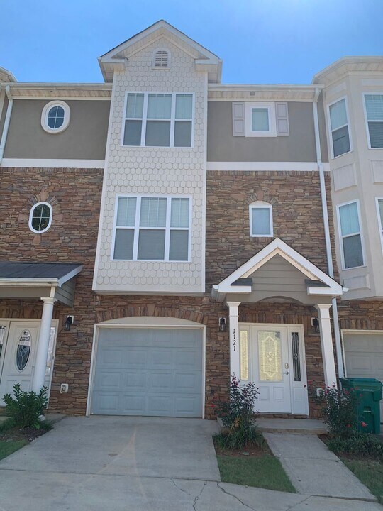 1121 Red Bud St in Greensboro, GA - Building Photo