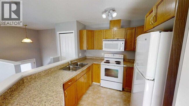 9804-9899 99 St in Wembley, AB - Building Photo - Building Photo