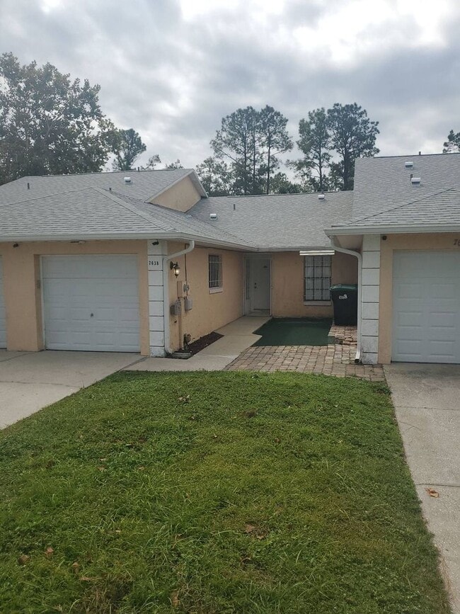 property at 7638 University Garden Dr