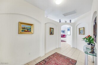 14823 Calusa Palms Dr in Ft. Myers, FL - Building Photo - Building Photo