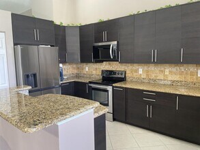 9514 Lago Dr in Boynton Beach, FL - Building Photo - Building Photo
